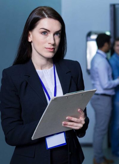 Serious beautiful woman holding notes Serious beautiful woman holding notes